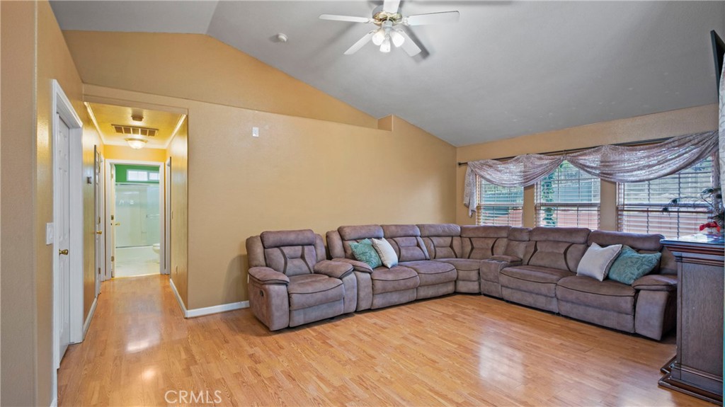 19070 Ravenhill Road Hidden Valley Lake, CA 95467 - Photo 3 of 27 a living room with furniture and a large window