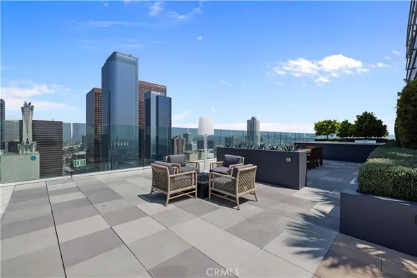 a view of a terrace with furniture