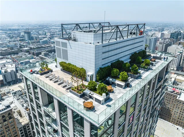 an aerial view of balcony with outdoor seating