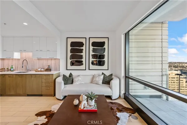 a living room with furniture and window