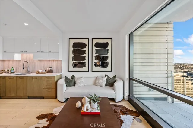 a living room with furniture and window