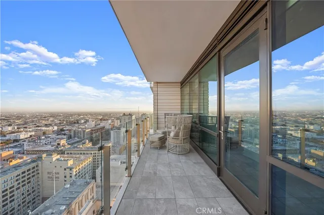 a view of a balcony with city view