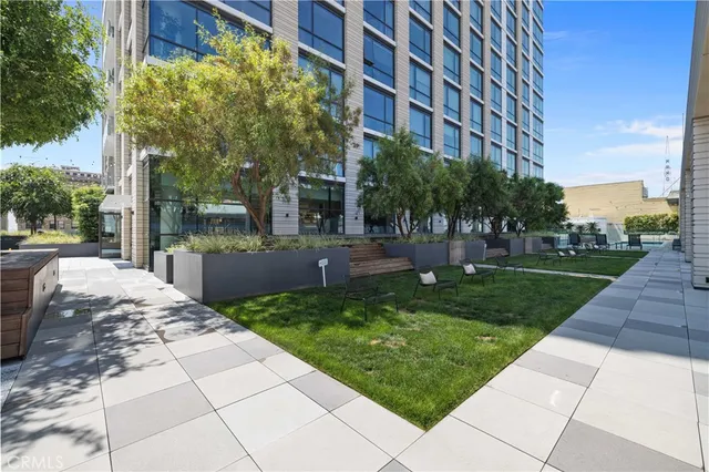 a view of a building with a yard