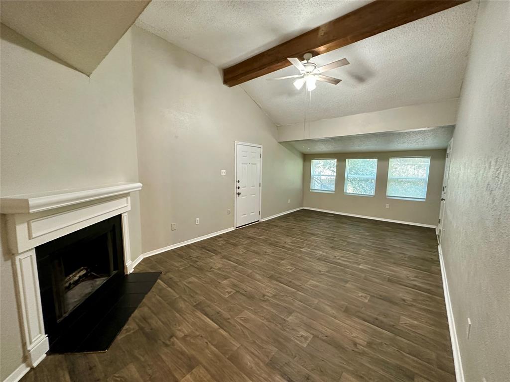 9696 Walnut Street, Unit 617 Dallas, TX 75243 - Photo 2 of 13 a view of empty room with wooden floor and fan