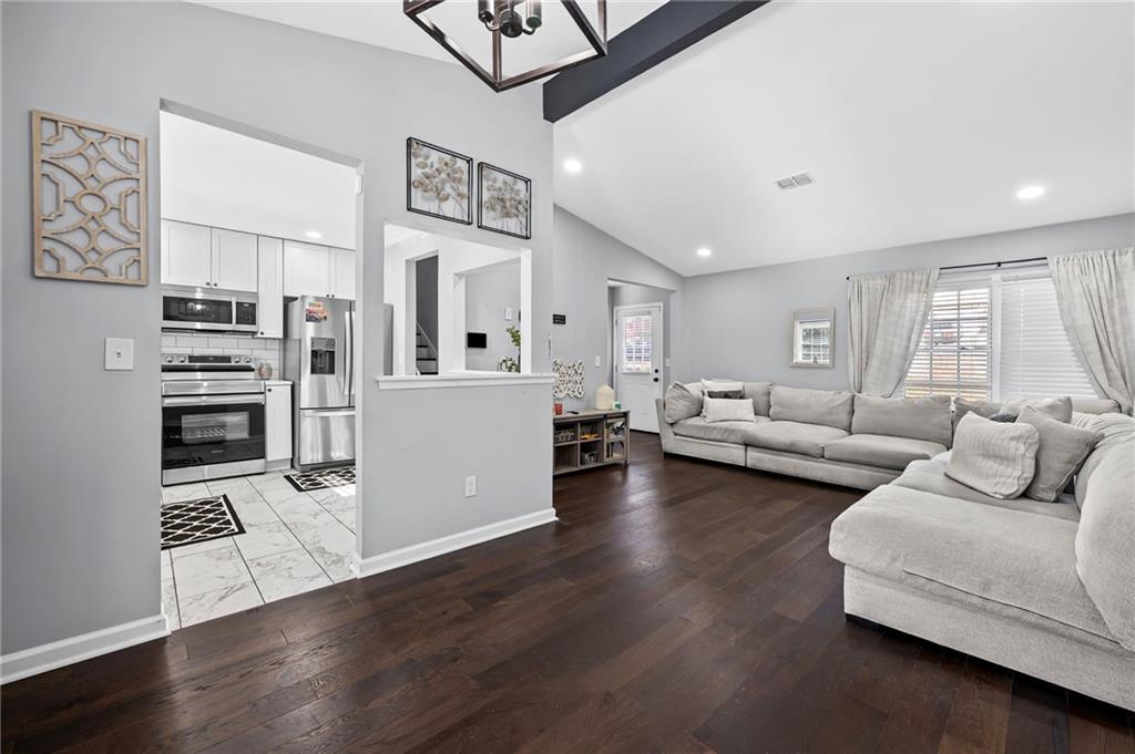 2468 Leslie Brook Drive Decatur, GA 30035 - Photo 12 of 39 a living room with furniture window and wooden floor