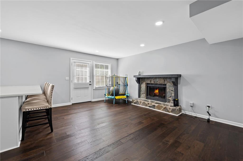 2468 Leslie Brook Drive Decatur, GA 30035 - Photo 17 of 39 a view of a livingroom with a fireplace and a window