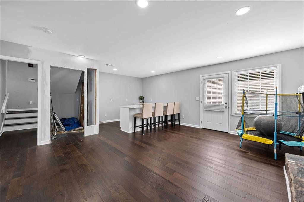 2468 Leslie Brook Drive Decatur, GA 30035 - Photo 20 of 39 a living room with furniture and wooden floor