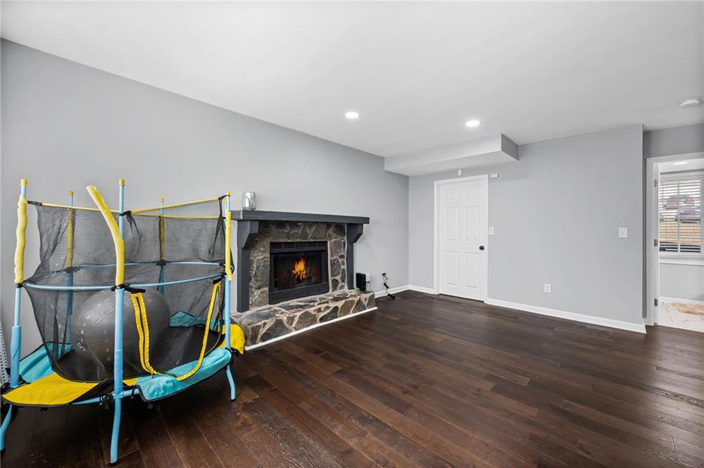 2468 Leslie Brook Drive Decatur, GA 30035 - Photo 21 of 39 a living room with furniture and a fireplace