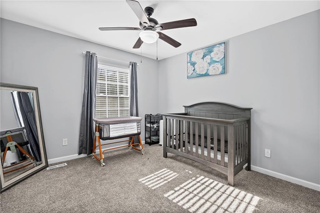 2468 Leslie Brook Drive Decatur, GA 30035 - Photo 28 of 39 a bedroom with furniture and a window