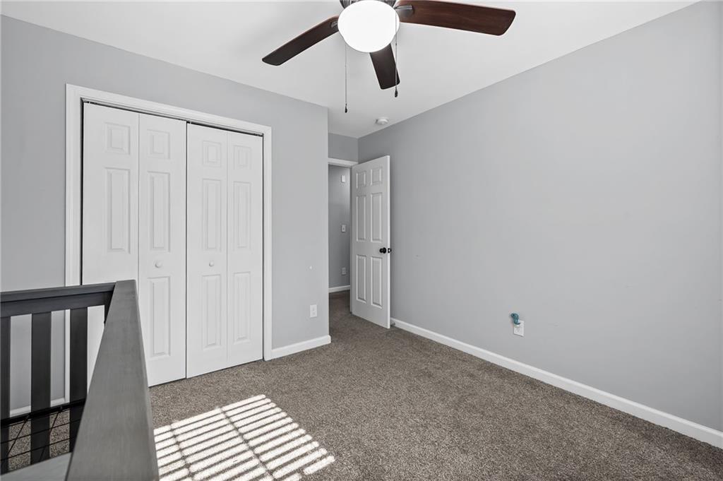 2468 Leslie Brook Drive Decatur, GA 30035 - Photo 29 of 39 wooden floor in an empty room with a window
