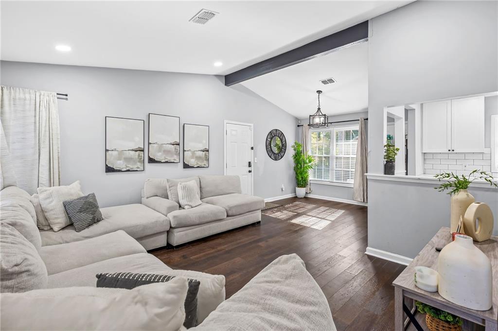 2468 Leslie Brook Drive Decatur, GA 30035 - Photo 8 of 39 a living room with furniture and a wooden floor