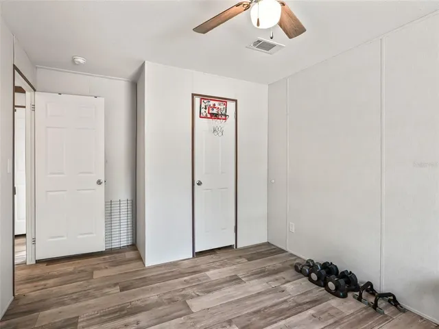 a view of a pool and a yard