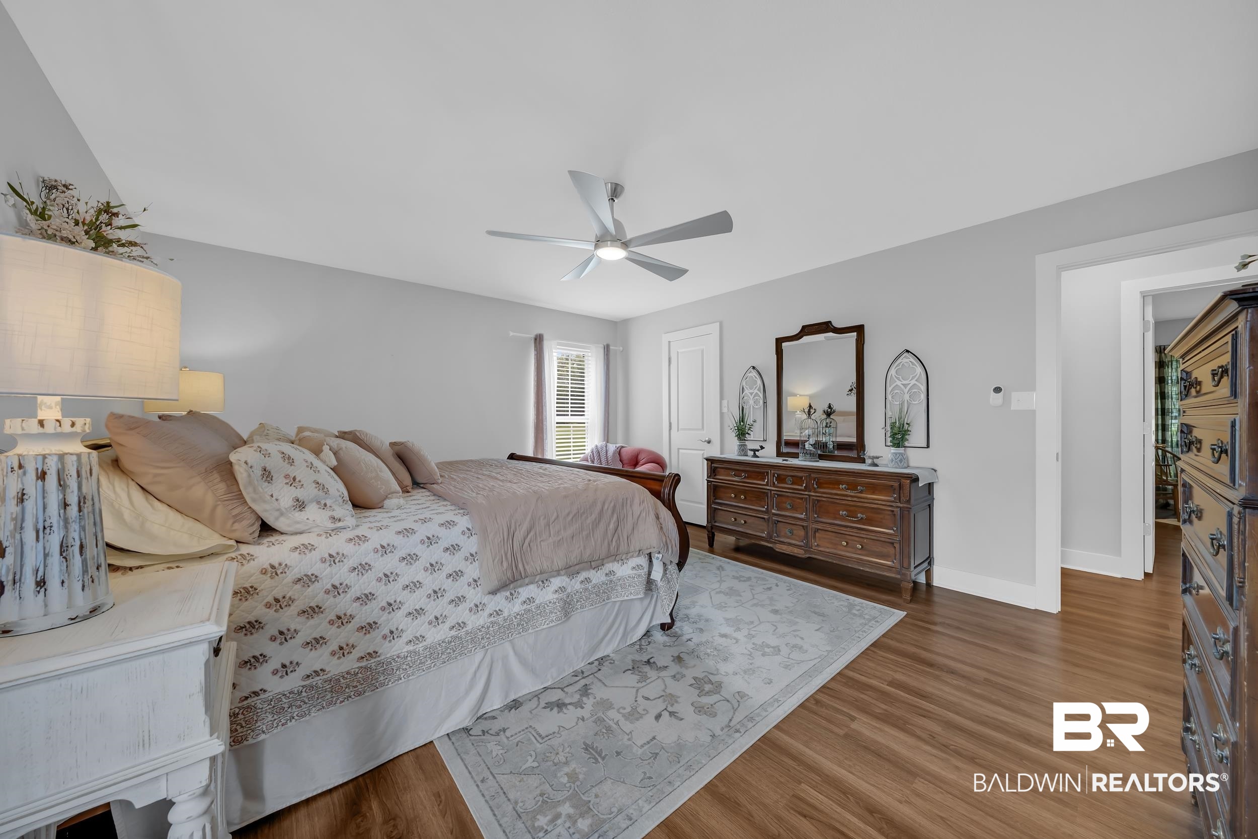 19090 Gunnison Road Fairhope, AL 36532 - Photo 20 of 42 Bedroom with wood finished floors and a ceiling fan