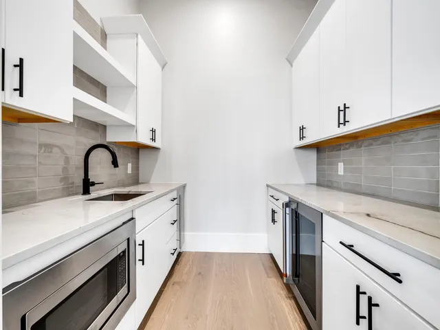 a view of swimming pool with a lake view