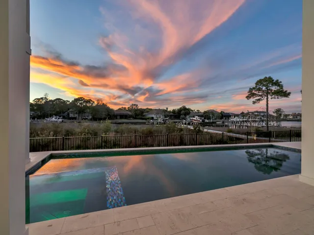 a bathroom with a shower and a sink