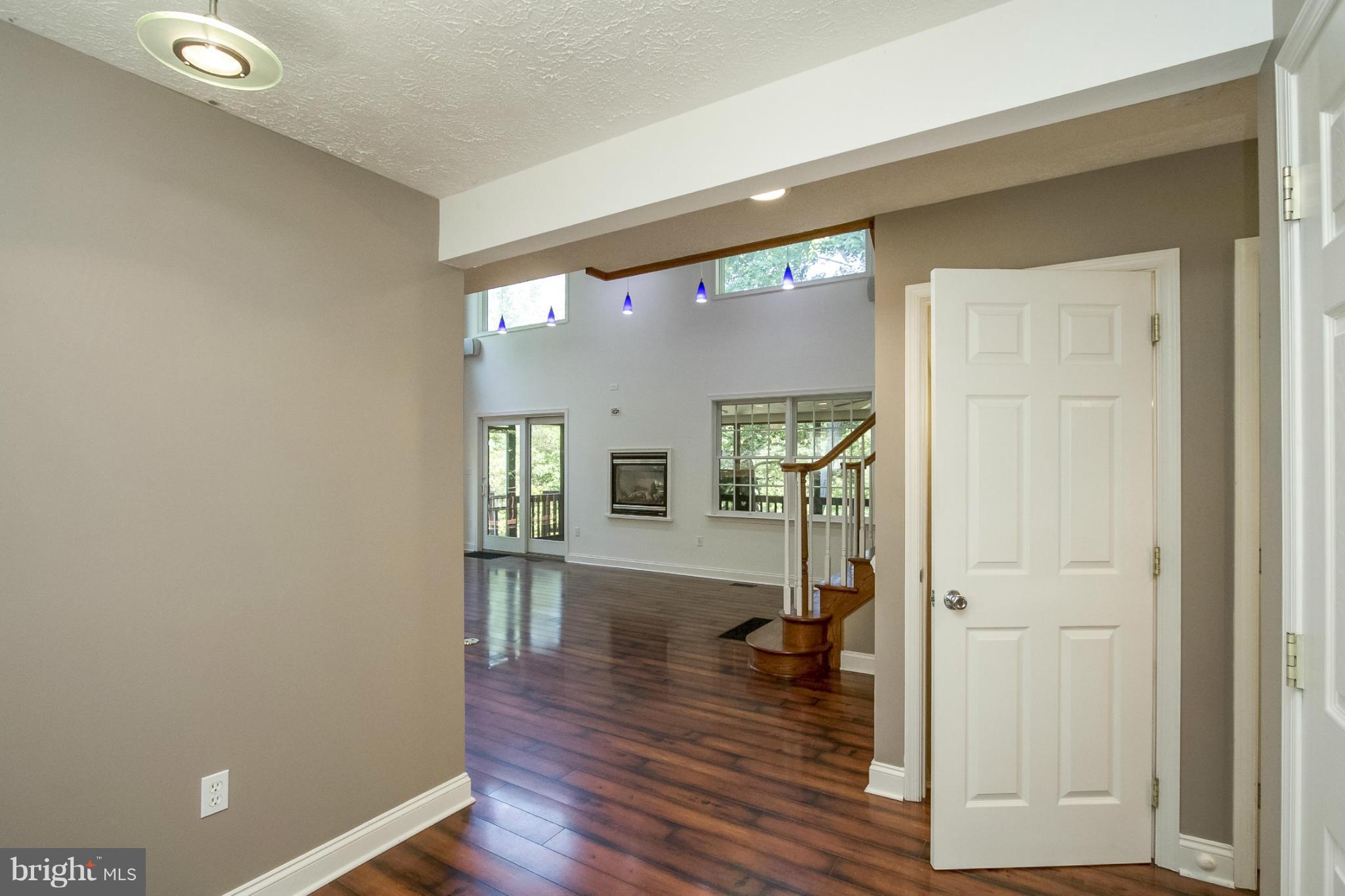 610 Running Fox Road Lusby, MD 20657 - Photo 23 of 30 wooden floor in a gallery