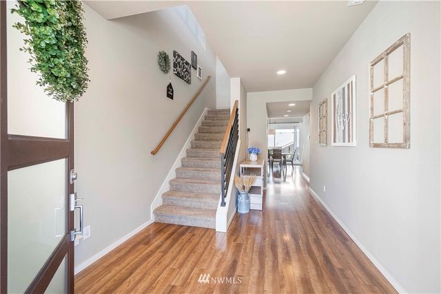 a view of entryway with wooden floor