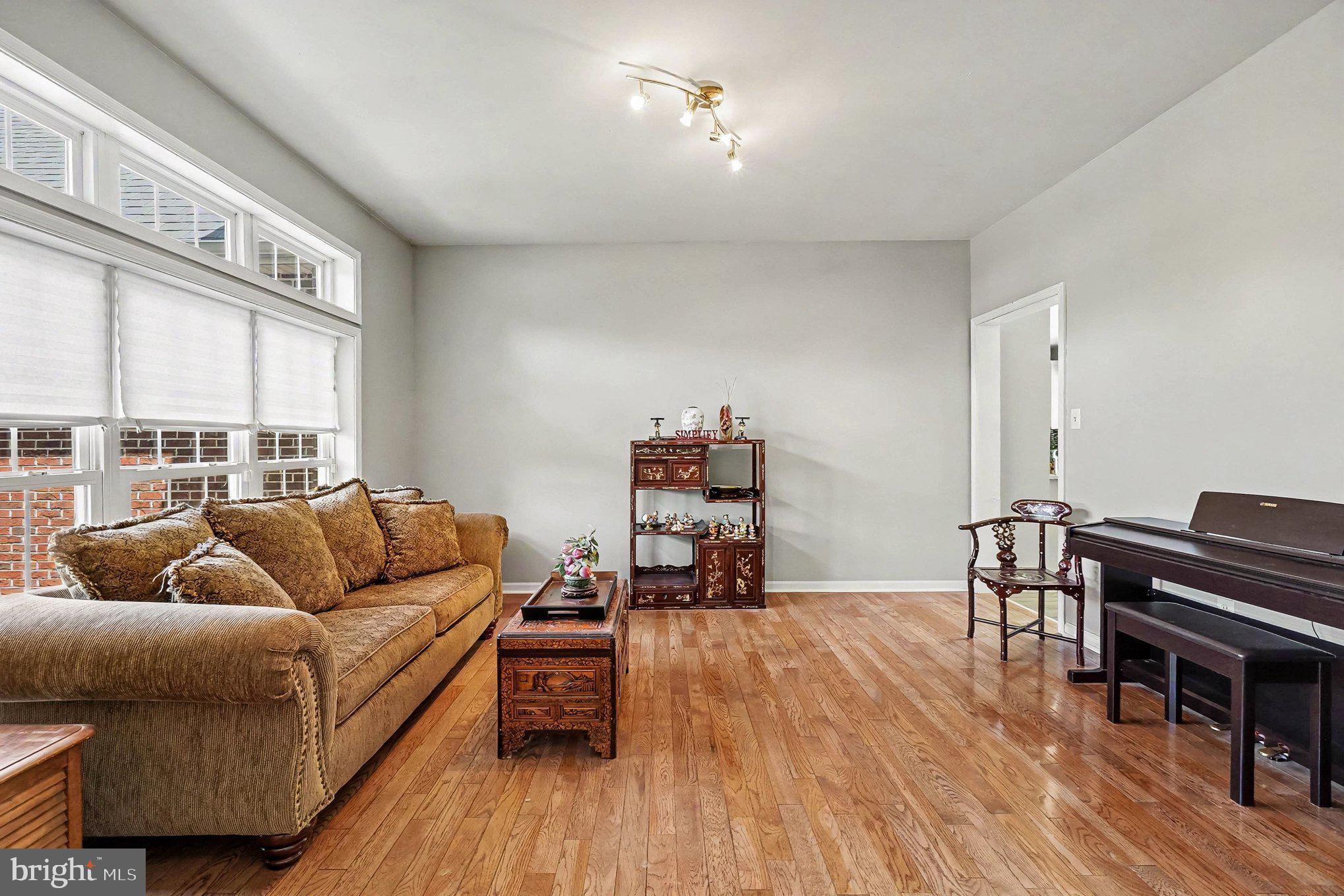 64 Open Meadow Court Elkton, MD 21921 - Photo 13 of 57 a living room with furniture and wooden floor