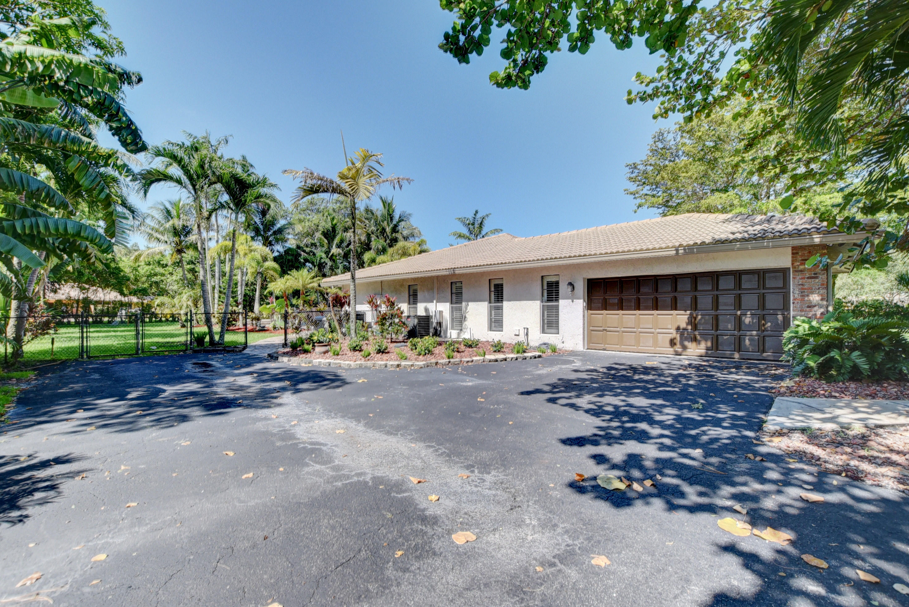 22585 Lemon Tree Lane Boca Raton, FL 33428 - Photo 21 of 22 Garage and Driveway