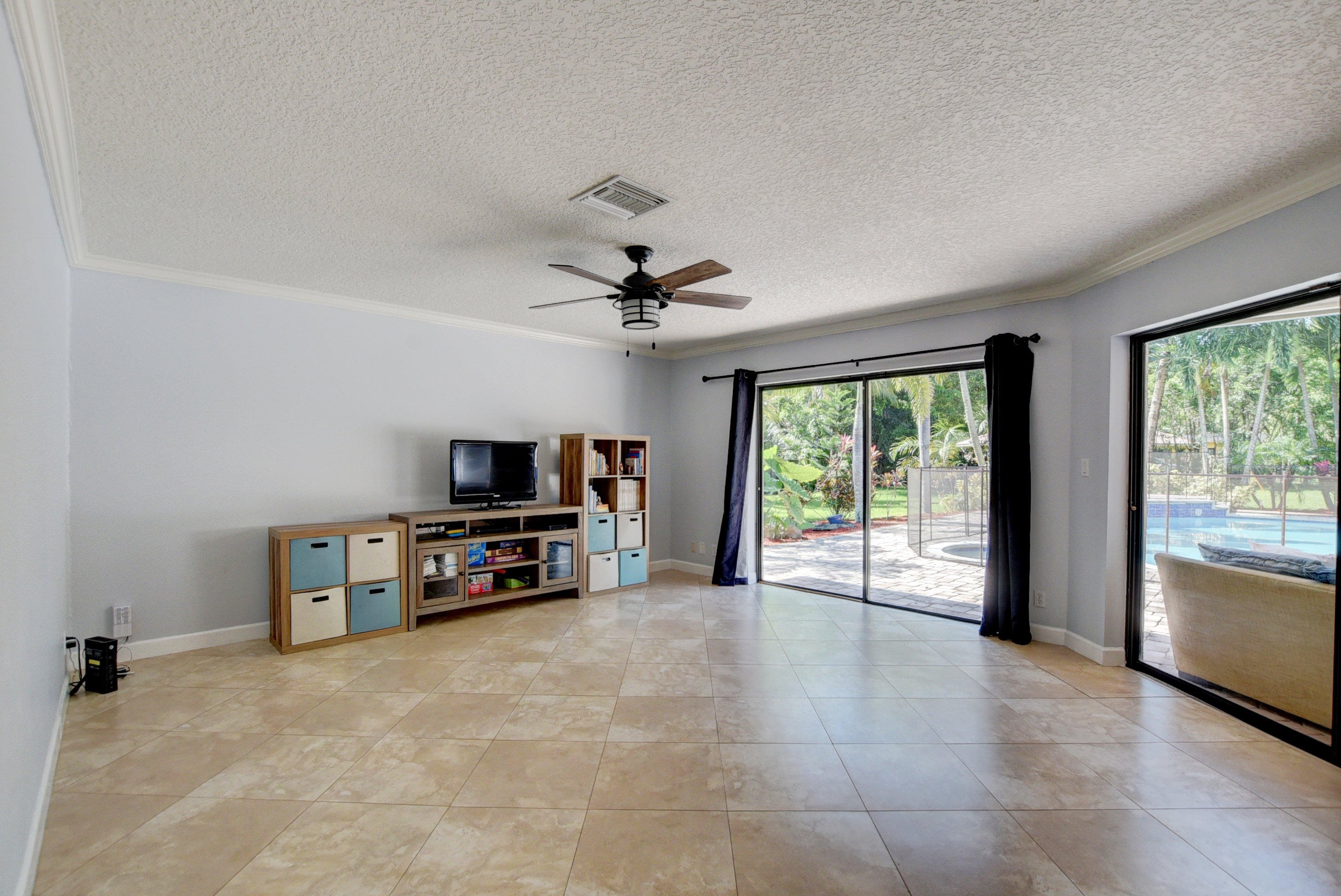 22585 Lemon Tree Lane Boca Raton, FL 33428 - Photo 9 of 22 Living Room Off Kitchen
