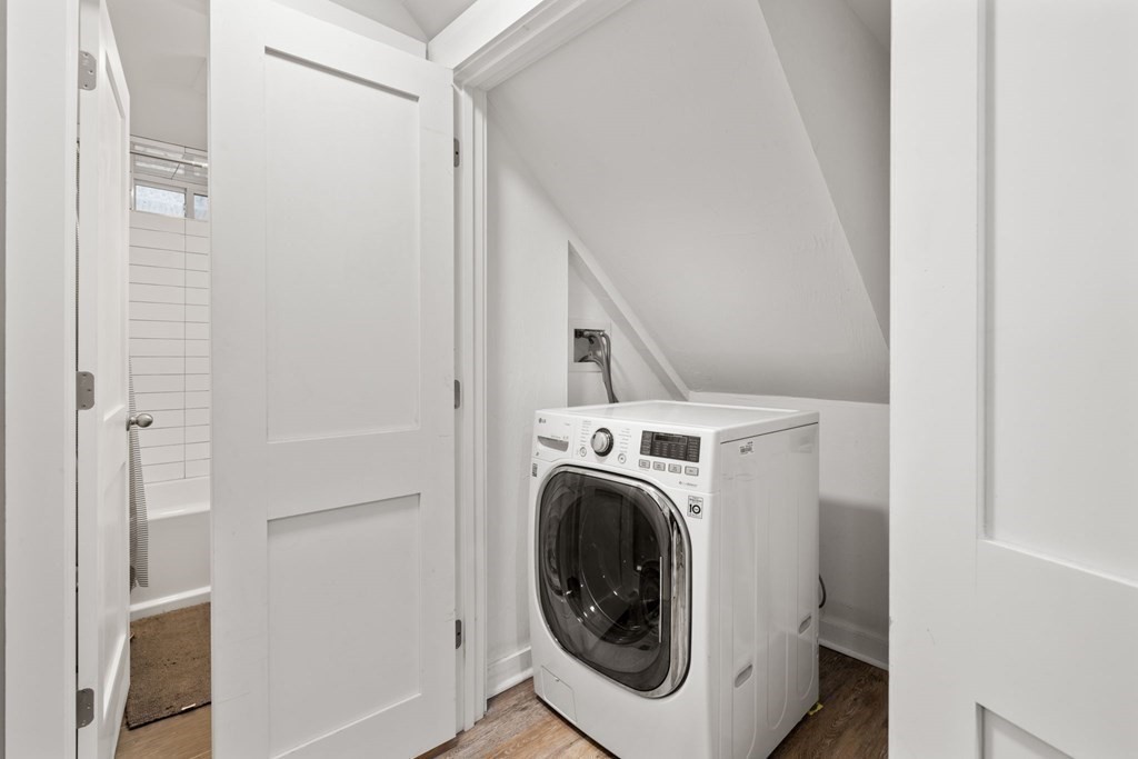 59 Mozart Street, Unit 1 Boston, MA 02130 - Photo 16 of 22 a utility room with dryer and washer