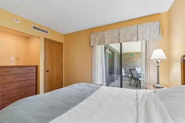 a living room with furniture and flat screen tv