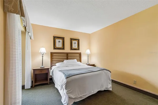 a living room with furniture and flat screen tv