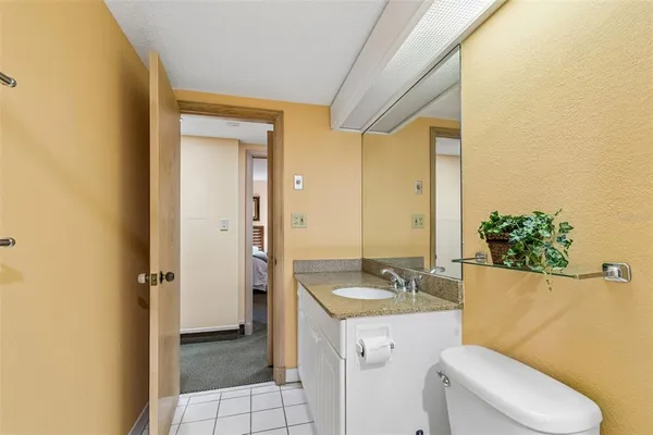 a bathroom with a shower and toilet