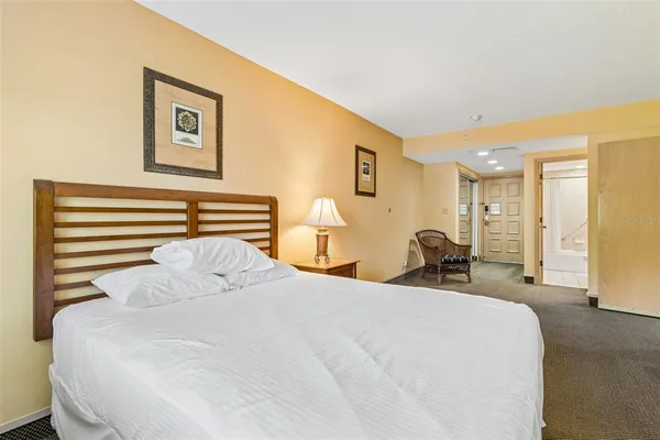 a view of a chairs and table in the patio