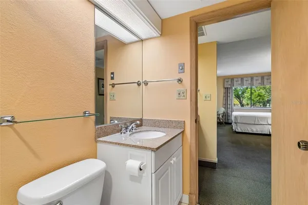 a view of a chairs and table in the patio