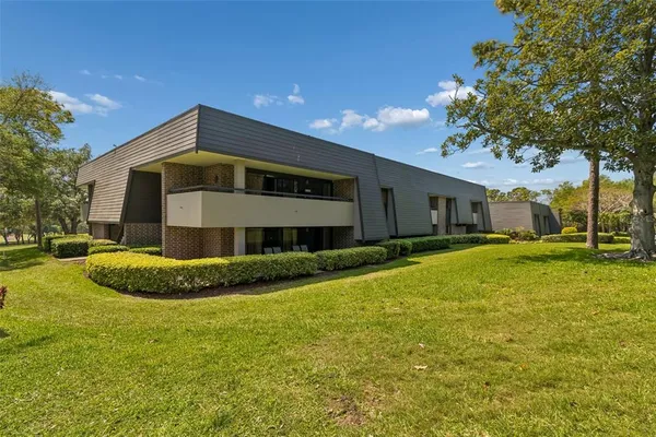 a outdoor space with lots of tables and chairs