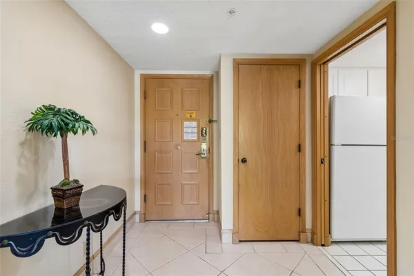 a kitchen with a stove and a refrigerator