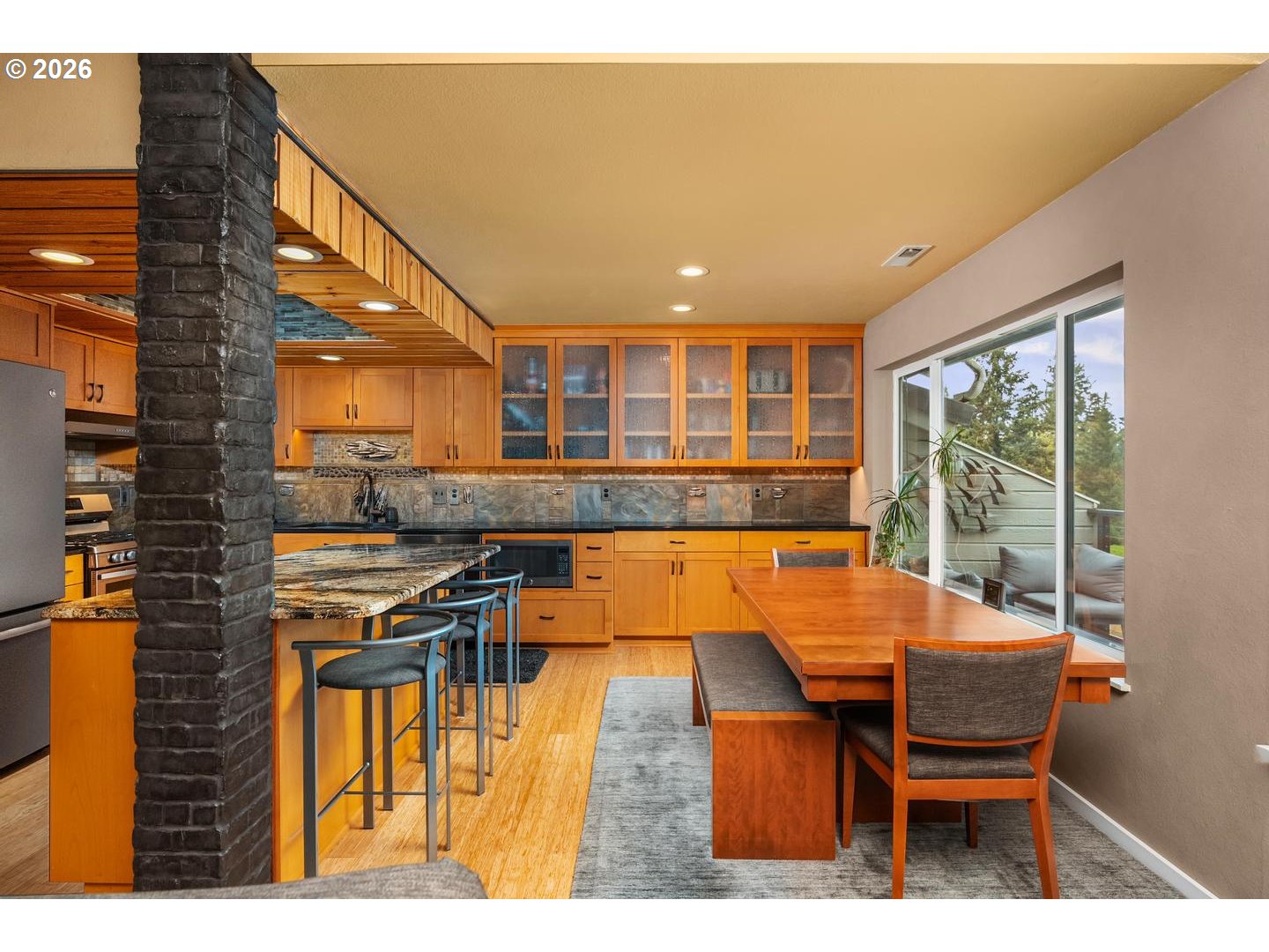 1840 Rees Hill Road Southeast, Unit 19 Salem, OR 97306 - Photo 10 of 34 a dining room with furniture and a floor to ceiling window