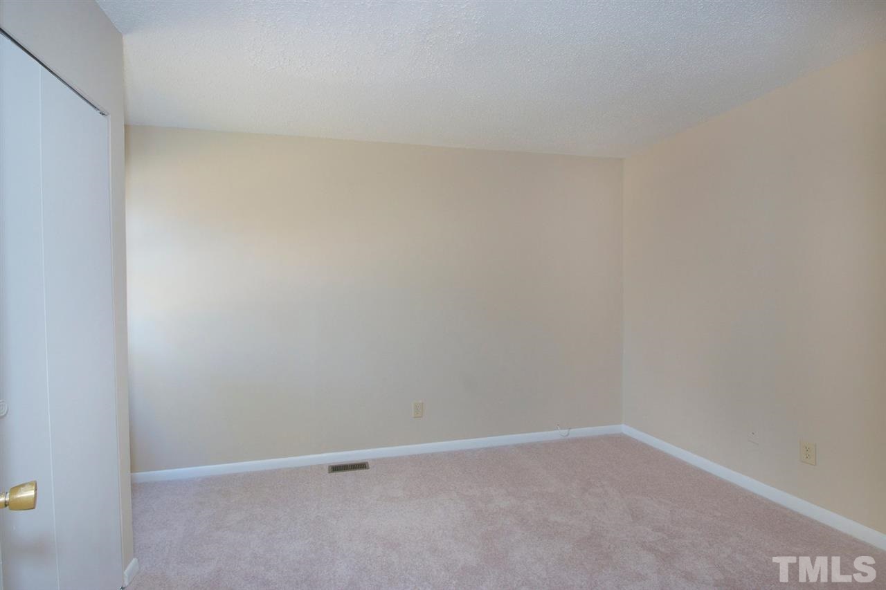 5924 Farm Gate Road Raleigh, NC 27606 - Photo 15 of 17 a view of an empty room