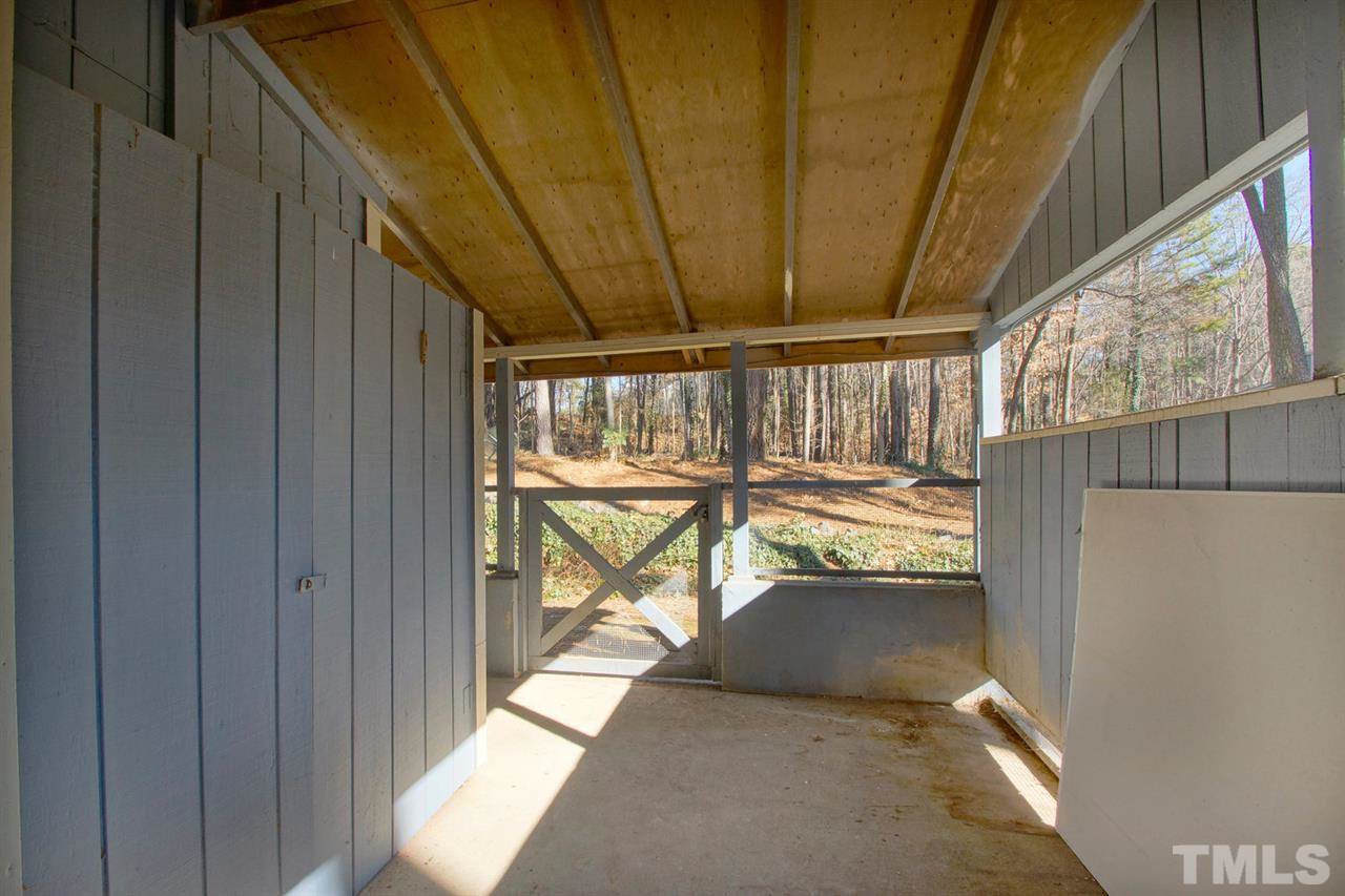5924 Farm Gate Road Raleigh, NC 27606 - Photo 16 of 17 a view of a porch