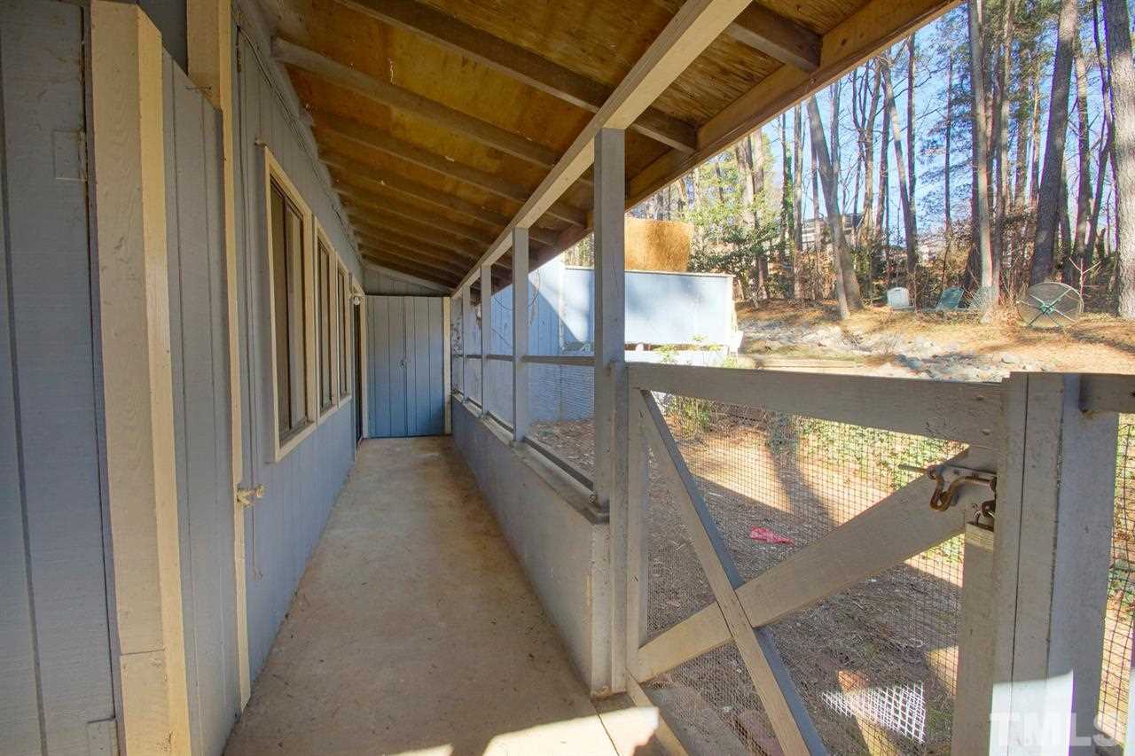 5924 Farm Gate Road Raleigh, NC 27606 - Photo 17 of 17 a view of swimming pool with a porch
