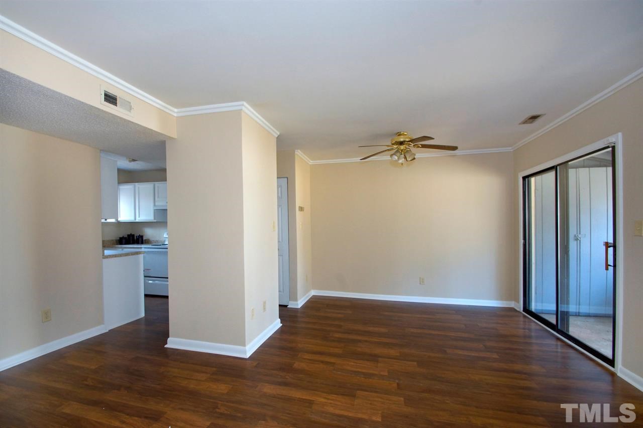 5924 Farm Gate Road Raleigh, NC 27606 - Photo 10 of 17 a view of empty room with wooden floor
