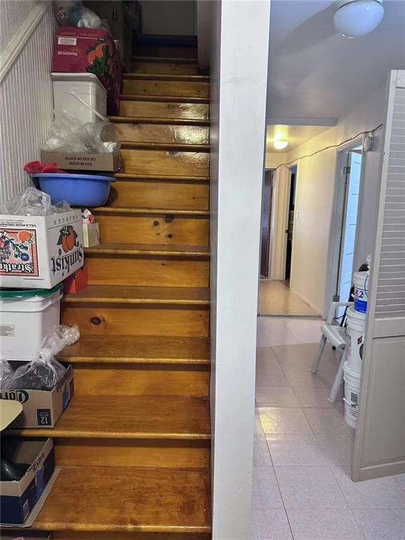458 58th Street Brooklyn, NY 11220 - Photo 5 of 11 a view of walk in closet with clothes and shoes