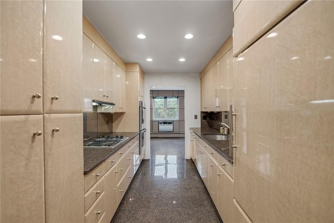 a large kitchen with cabinets