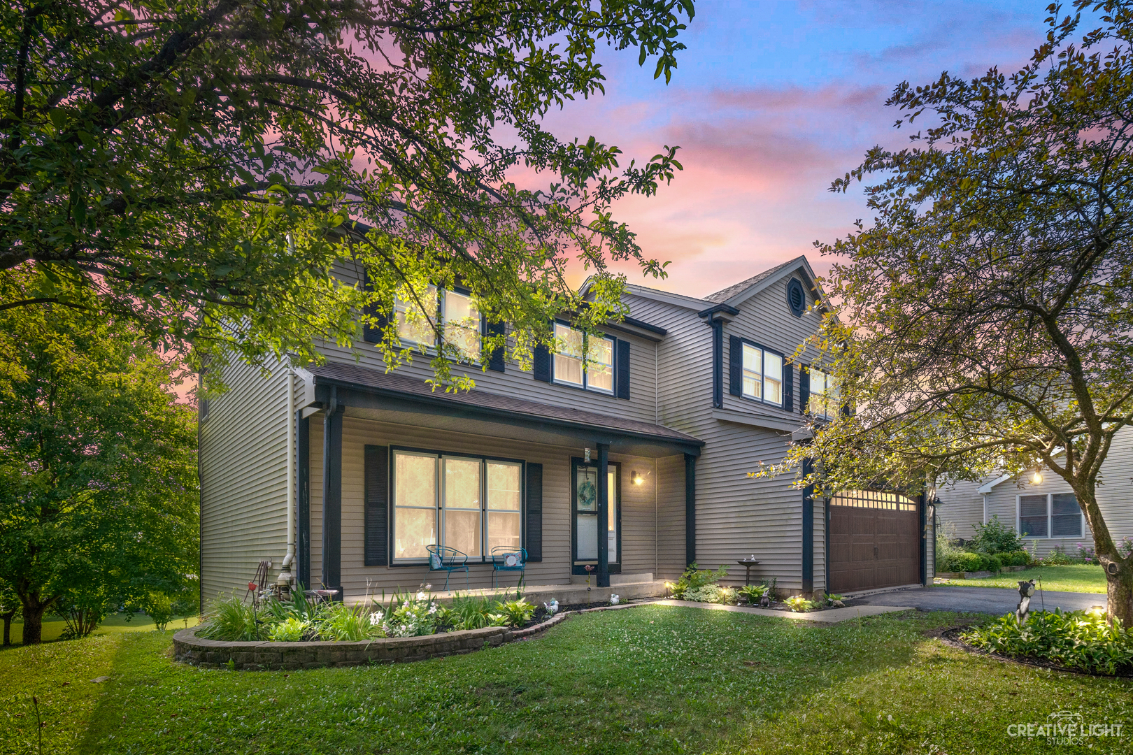 341 Timber Oaks Drive North Aurora, IL 60542 - Photo 1 of 20 a front view of a house with a yard