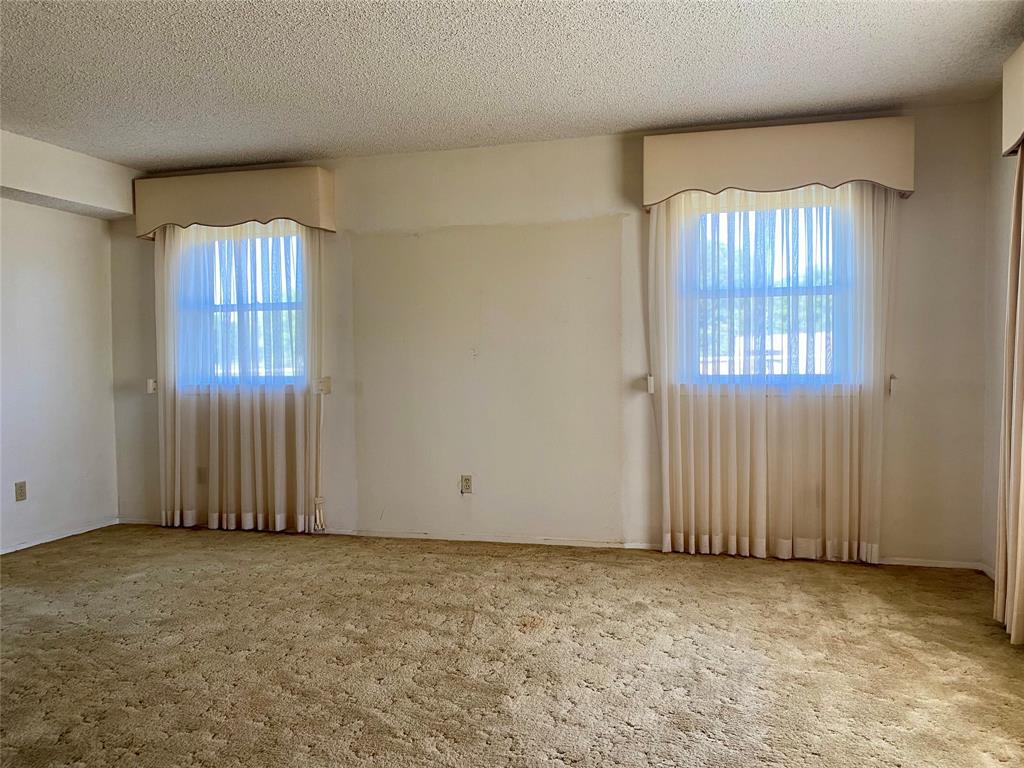 2506 Fm 272 Celeste, TX 75423 - Photo 3 of 36 an empty room with windows