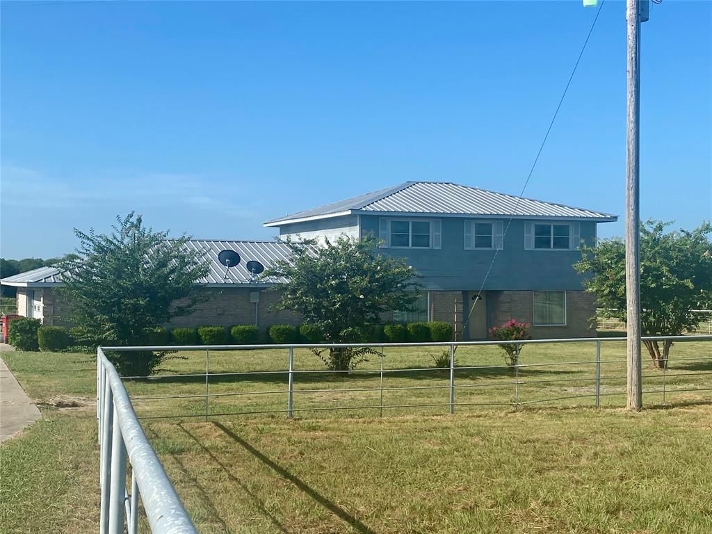 2506 Fm 272 Celeste, TX 75423 - Photo 32 of 36 a view of a house with a yard
