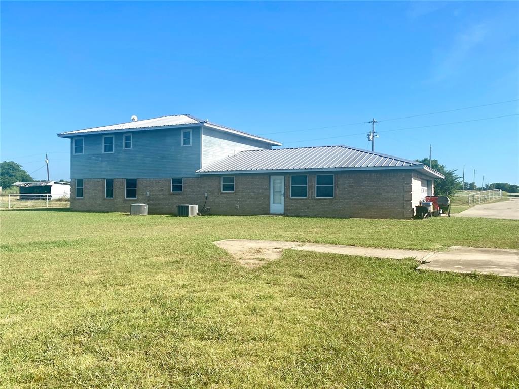 2506 Fm 272 Celeste, TX 75423 - Photo 34 of 36 a front view of a house with a yard