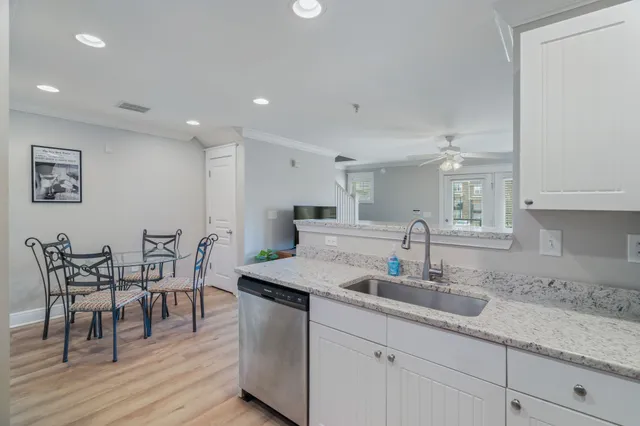 a bedroom with a bed and a table