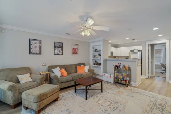 a living room with furniture and a window