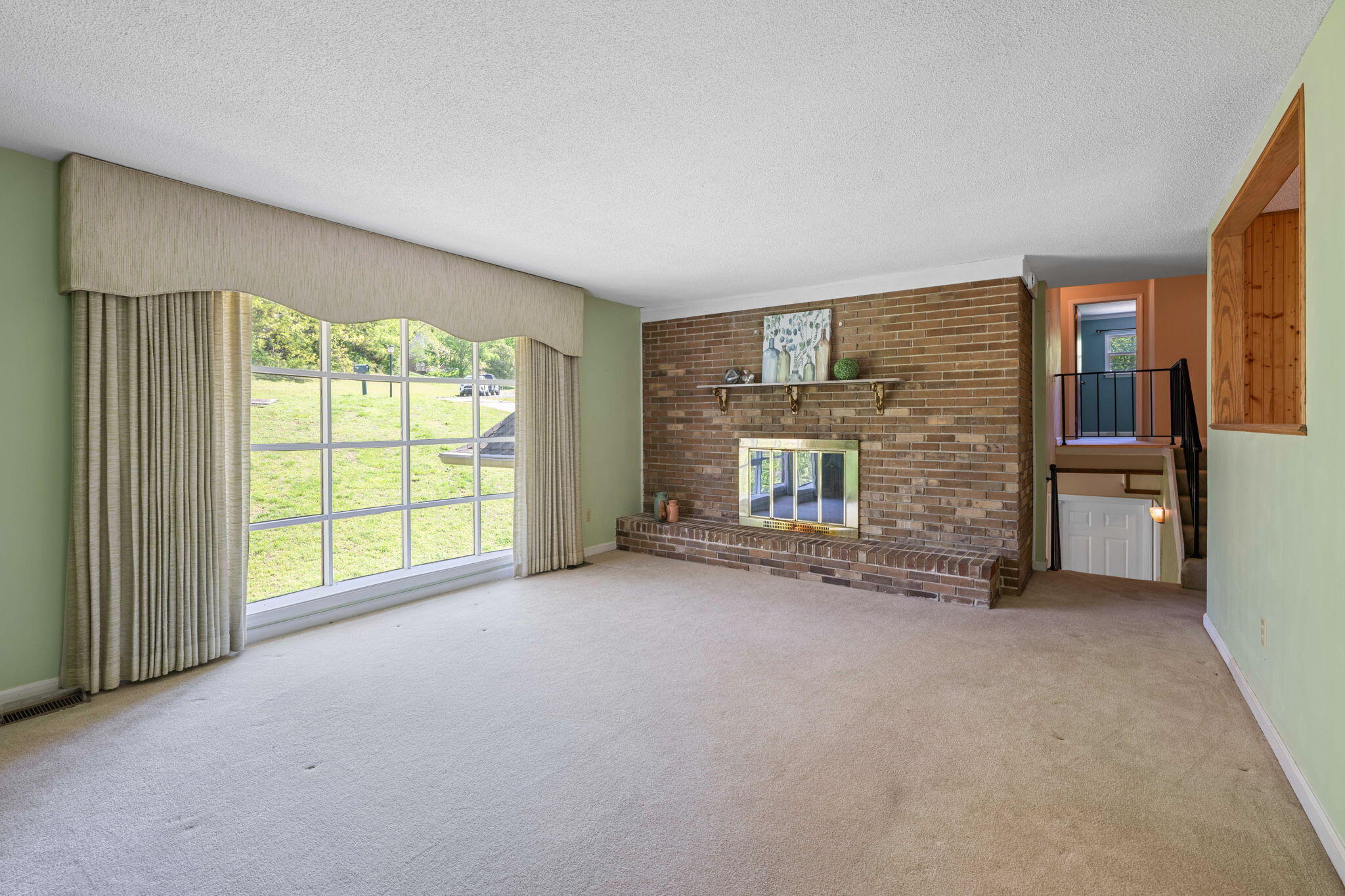 132 Timber Ridge Trail Ringgold, GA 30736 - Photo 5 of 39 Living Room Fireplace & picture window