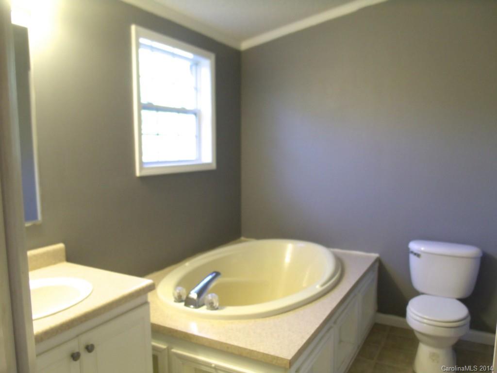 8333 Smith Road, Unit 5 88AC Kannapolis, NC 28081 - Photo 8 of 24 a bathroom with a sink and a toilet