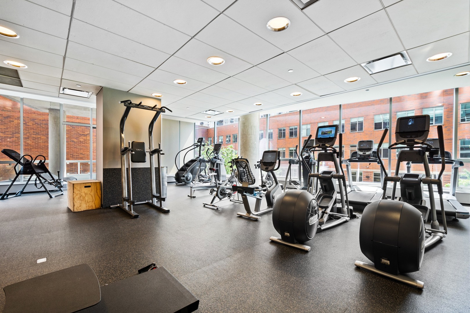 30 West Oak Street, Unit 5E Chicago, IL 60610 - Photo 21 of 22 a view of a room with gym equipment
