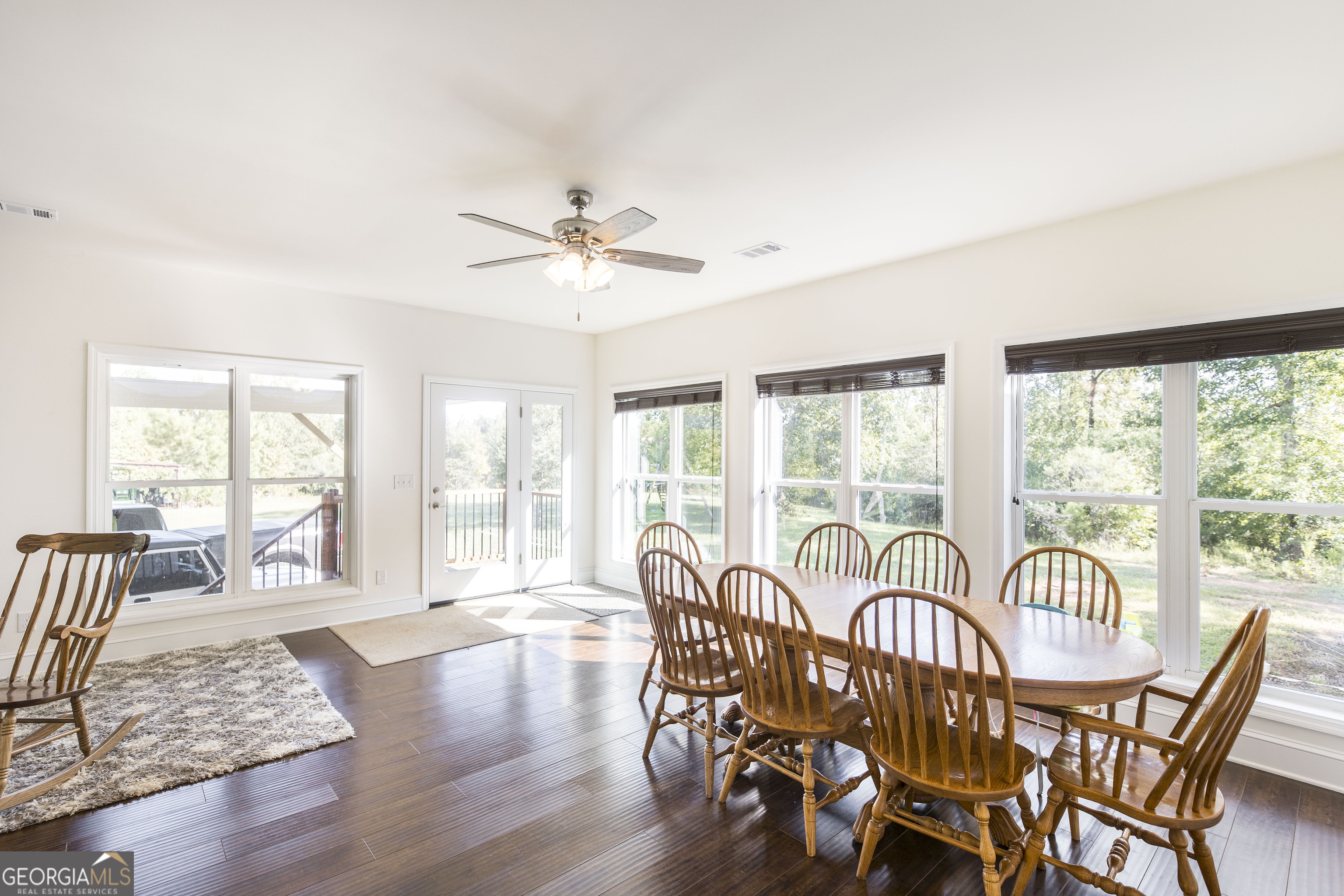 1979 Dent Road Musella, GA 31066 - Photo 17 of 77 a view of a dining room with furniture window and wooden floor