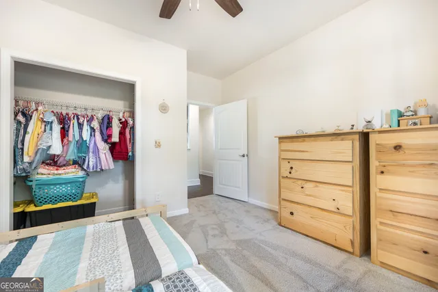 a view of a livingroom with furniture and wooden floor